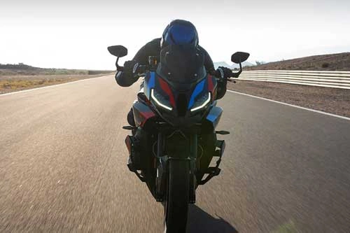 BMW M 1000 XR riding on a racetrack